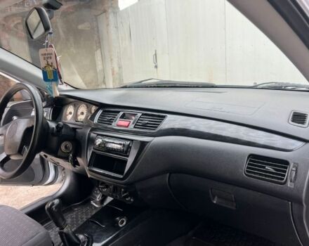 Серый Мицубиси Лансер, объемом двигателя 1.6 л и пробегом 178 тыс. км за 3200 $, фото 5 на Automoto.ua