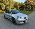 Сірий Міцубісі Lancer, об'ємом двигуна 2 л та пробігом 360 тис. км за 3400 $, фото 1 на Automoto.ua