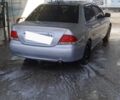 Сірий Міцубісі Lancer, об'ємом двигуна 1.59 л та пробігом 60 тис. км за 2500 $, фото 1 на Automoto.ua