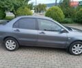 Сірий Міцубісі Lancer, об'ємом двигуна 1.58 л та пробігом 200 тис. км за 4000 $, фото 7 на Automoto.ua
