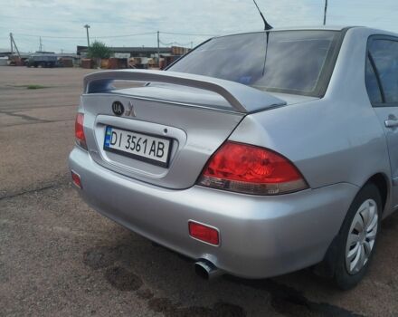 Серый Мицубиси Лансер, объемом двигателя 1.6 л и пробегом 250 тыс. км за 3600 $, фото 15 на Automoto.ua