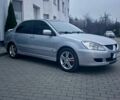 Сірий Міцубісі Lancer, об'ємом двигуна 2 л та пробігом 187 тис. км за 4497 $, фото 1 на Automoto.ua