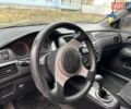Серый Мицубиси Лансер, объемом двигателя 2 л и пробегом 249 тыс. км за 3800 $, фото 10 на Automoto.ua