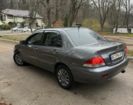 Сірий Міцубісі Lancer, об'ємом двигуна 1.6 л та пробігом 230 тис. км за 2799 $, фото 11 на Automoto.ua