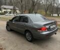 Сірий Міцубісі Lancer, об'ємом двигуна 1.6 л та пробігом 230 тис. км за 2799 $, фото 11 на Automoto.ua