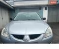 Сірий Міцубісі Lancer, об'ємом двигуна 1.6 л та пробігом 228 тис. км за 2850 $, фото 1 на Automoto.ua