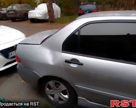 Сірий Міцубісі Lancer, об'ємом двигуна 1.6 л та пробігом 360 тис. км за 1999 $, фото 3 на Automoto.ua