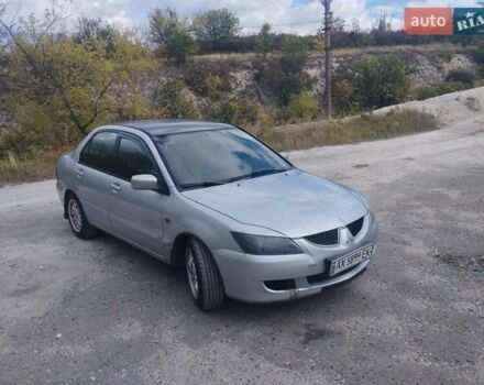 Сірий Міцубісі Lancer, об'ємом двигуна 1.6 л та пробігом 244 тис. км за 3300 $, фото 1 на Automoto.ua