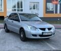 Серый Мицубиси Лансер, объемом двигателя 1.58 л и пробегом 280 тыс. км за 3599 $, фото 1 на Automoto.ua
