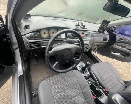 Серый Мицубиси Лансер, объемом двигателя 1.6 л и пробегом 200 тыс. км за 3906 $, фото 8 на Automoto.ua