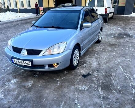 Сірий Міцубісі Lancer, об'ємом двигуна 1.6 л та пробігом 300 тис. км за 4200 $, фото 1 на Automoto.ua