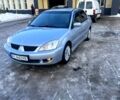 Сірий Міцубісі Lancer, об'ємом двигуна 1.6 л та пробігом 300 тис. км за 4200 $, фото 1 на Automoto.ua