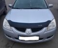 Сірий Міцубісі Lancer, об'ємом двигуна 1.6 л та пробігом 27 тис. км за 4200 $, фото 1 на Automoto.ua