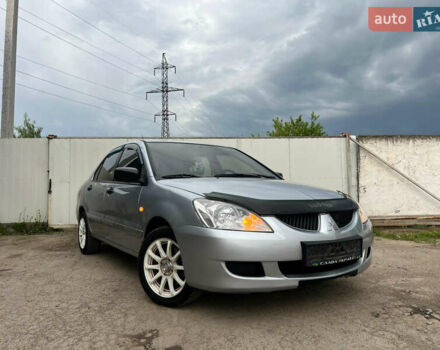 Сірий Міцубісі Lancer, об'ємом двигуна 1.6 л та пробігом 310 тис. км за 3350 $, фото 10 на Automoto.ua