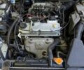 Серый Мицубиси Лансер, объемом двигателя 1.6 л и пробегом 300 тыс. км за 4500 $, фото 1 на Automoto.ua