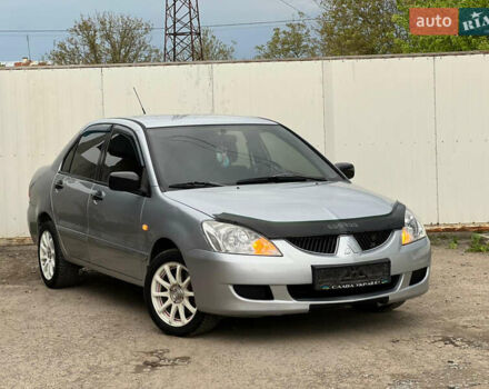 Сірий Міцубісі Lancer, об'ємом двигуна 1.6 л та пробігом 310 тис. км за 3350 $, фото 6 на Automoto.ua