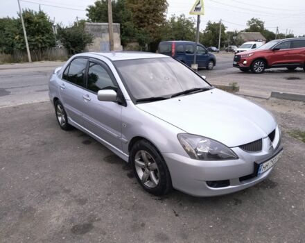 Серый Мицубиси Лансер, объемом двигателя 2 л и пробегом 212 тыс. км за 4300 $, фото 1 на Automoto.ua