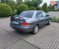 Сірий Міцубісі Lancer, об'ємом двигуна 1.58 л та пробігом 200 тис. км за 4000 $, фото 3 на Automoto.ua