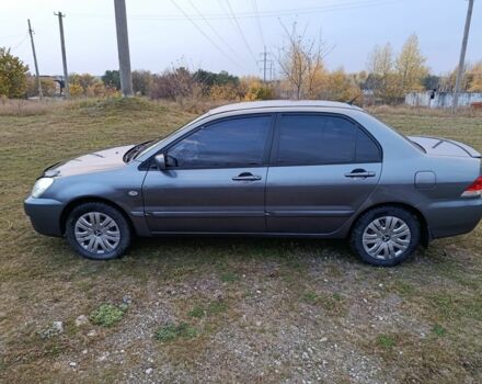Міцубісі Lancer 2005 у Кам'янське (Дніпродзержинськ) на Automoto.ua Сірий Міцубісі Lancer, об'ємом двигуна 1.6 л та пробігом 220 тис. км за 4100 $, фото 3 на Automoto.ua