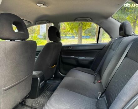 Мицубиси Лансер 2005 в Киеве на Automoto.ua Серый Мицубиси Лансер, объемом двигателя 1.6 л и пробегом 196 тыс. км за 4490 $, фото 21 на Automoto.ua