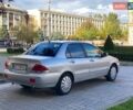 Серый Мицубиси Лансер, объемом двигателя 1.58 л и пробегом 200 тыс. км за 3850 $, фото 1 на Automoto.ua