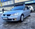 Сірий Міцубісі Lancer, об'ємом двигуна 1.6 л та пробігом 300 тис. км за 4200 $, фото 2 на Automoto.ua