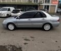 Серый Мицубиси Лансер, объемом двигателя 1.58 л и пробегом 290 тыс. км за 3800 $, фото 2 на Automoto.ua
