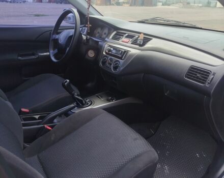 Серый Мицубиси Лансер, объемом двигателя 1.6 л и пробегом 250 тыс. км за 3600 $, фото 23 на Automoto.ua