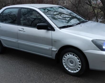 Серый Мицубиси Лансер, объемом двигателя 1.6 л и пробегом 235 тыс. км за 2850 $, фото 6 на Automoto.ua