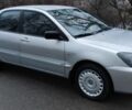 Серый Мицубиси Лансер, объемом двигателя 1.6 л и пробегом 235 тыс. км за 2850 $, фото 6 на Automoto.ua