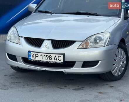 Сірий Міцубісі Lancer, об'ємом двигуна 1.58 л та пробігом 188 тис. км за 3799 $, фото 1 на Automoto.ua