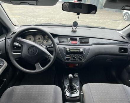 Сірий Міцубісі Lancer, об'ємом двигуна 1.6 л та пробігом 231 тис. км за 3500 $, фото 6 на Automoto.ua