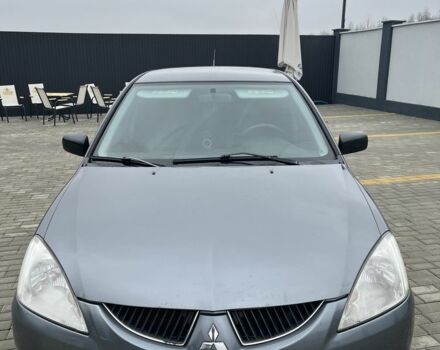 Сірий Міцубісі Lancer, об'ємом двигуна 1.6 л та пробігом 231 тис. км за 3500 $, фото 1 на Automoto.ua