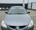 Сірий Міцубісі Lancer, об'ємом двигуна 1.6 л та пробігом 231 тис. км за 3500 $, фото 1 на Automoto.ua