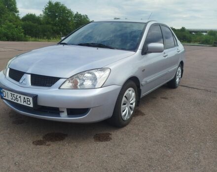 Серый Мицубиси Лансер, объемом двигателя 1.6 л и пробегом 250 тыс. км за 3600 $, фото 14 на Automoto.ua