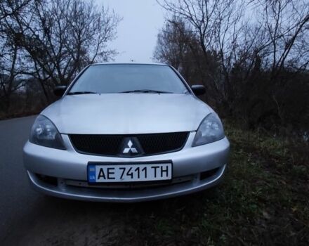 Серый Мицубиси Лансер, объемом двигателя 1.6 л и пробегом 235 тыс. км за 2850 $, фото 21 на Automoto.ua