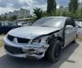 Серый Мицубиси Лансер, объемом двигателя 1.6 л и пробегом 240 тыс. км за 1199 $, фото 1 на Automoto.ua