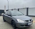 Сірий Міцубісі Lancer, об'ємом двигуна 1.6 л та пробігом 231 тис. км за 3500 $, фото 1 на Automoto.ua