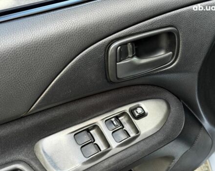 Мицубиси Лансер 2005 в Киеве на Automoto.ua Серый Мицубиси Лансер, объемом двигателя 1.6 л и пробегом 196 тыс. км за 4490 $, фото 12 на Automoto.ua