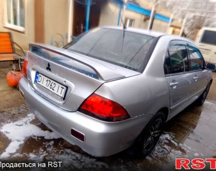 Сірий Міцубісі Lancer, об'ємом двигуна 1.6 л та пробігом 270 тис. км за 3900 $, фото 1 на Automoto.ua