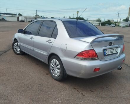 Серый Мицубиси Лансер, объемом двигателя 1.6 л и пробегом 250 тыс. км за 3600 $, фото 4 на Automoto.ua