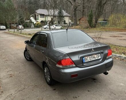 Сірий Міцубісі Lancer, об'ємом двигуна 1.6 л та пробігом 230 тис. км за 2799 $, фото 13 на Automoto.ua