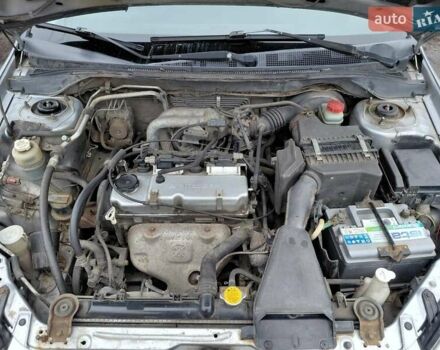 Серый Мицубиси Лансер, объемом двигателя 1.6 л и пробегом 277 тыс. км за 3500 $, фото 8 на Automoto.ua