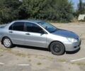 Сірий Міцубісі Lancer, об'ємом двигуна 1.6 л та пробігом 218 тис. км за 3300 $, фото 1 на Automoto.ua