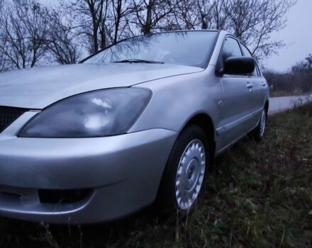 Серый Мицубиси Лансер, объемом двигателя 1.6 л и пробегом 235 тыс. км за 2850 $, фото 20 на Automoto.ua