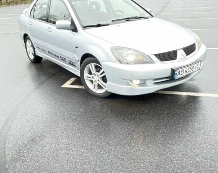 Сірий Міцубісі Lancer, об'ємом двигуна 2 л та пробігом 1 тис. км за 3500 $, фото 1 на Automoto.ua