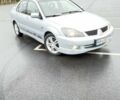 Сірий Міцубісі Lancer, об'ємом двигуна 2 л та пробігом 1 тис. км за 3500 $, фото 1 на Automoto.ua