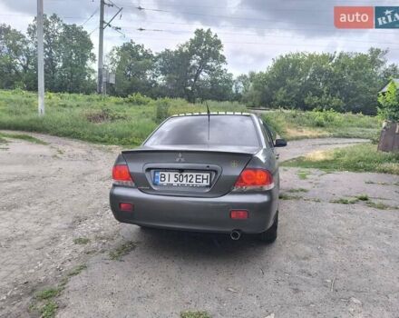 Сірий Міцубісі Lancer, об'ємом двигуна 1.6 л та пробігом 257 тис. км за 3700 $, фото 4 на Automoto.ua