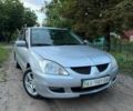 Сірий Міцубісі Lancer, об'ємом двигуна 0 л та пробігом 262 тис. км за 3300 $, фото 1 на Automoto.ua