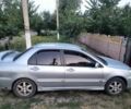 Серый Мицубиси Лансер, объемом двигателя 1.6 л и пробегом 350 тыс. км за 3601 $, фото 1 на Automoto.ua